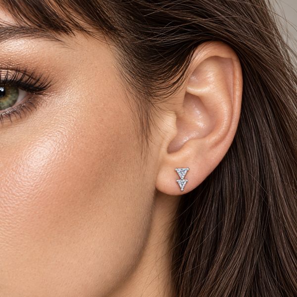 PIERCING WITH TWO TRIANGLES AND CRYSTALS