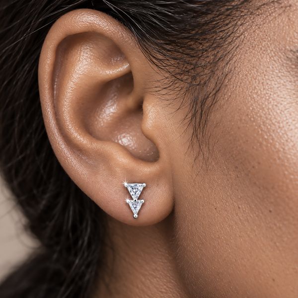 PIERCING WITH TWO TRIANGLES AND CRYSTALS