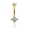 Golden belly button piercing with crystal star