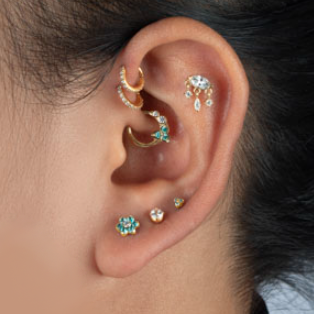 ACCESSORIO PIERCING A FORMA DI OCCHIO PLACCATO ORO CON CRISTALLI 