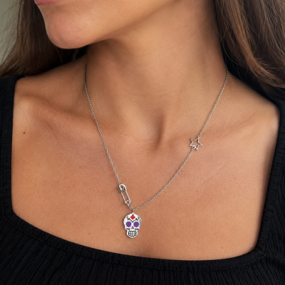 COLLANA CON TESCHIO E SPILLA DA BALIA