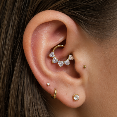 PIERCING CLICKER EN OR AVEC CRISTAUX EN FORME DE COEUR